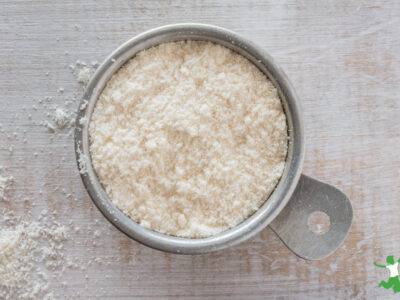 coconut flour soaking overnight in a stainless steel bowl