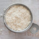 coconut flour soaking overnight in a stainless steel bowl