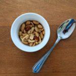 homemade honey roasted peanuts in a ramekin