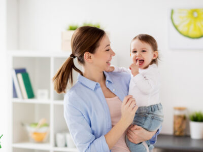 mother using natural teething remedy for her baby