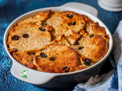 bread and butter pudding in white baking dish