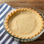 healthy keto pie crust on blue striped napkin