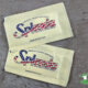 two yellow packets of DNA damaging Splenda