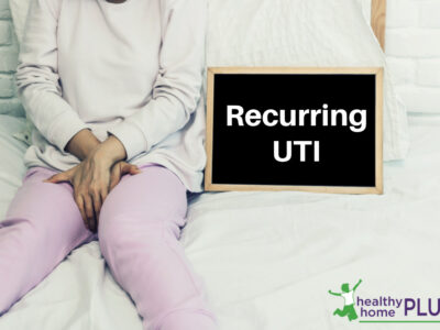 woman in pain from recurrent UTI