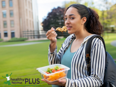 college student eating healthy food from glass container