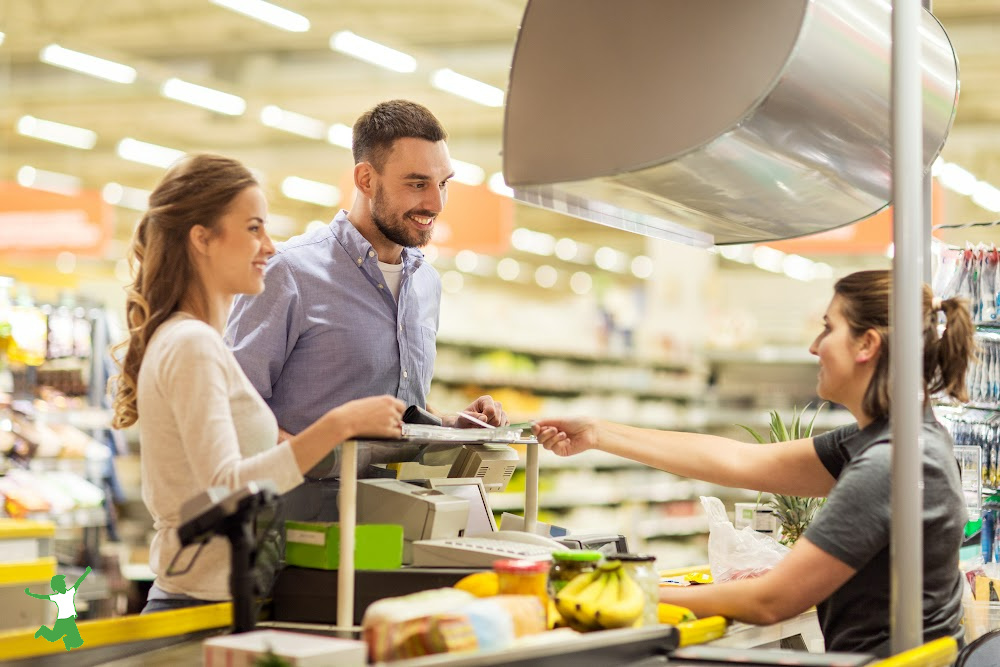 couple checking out at whole foods with biometrics