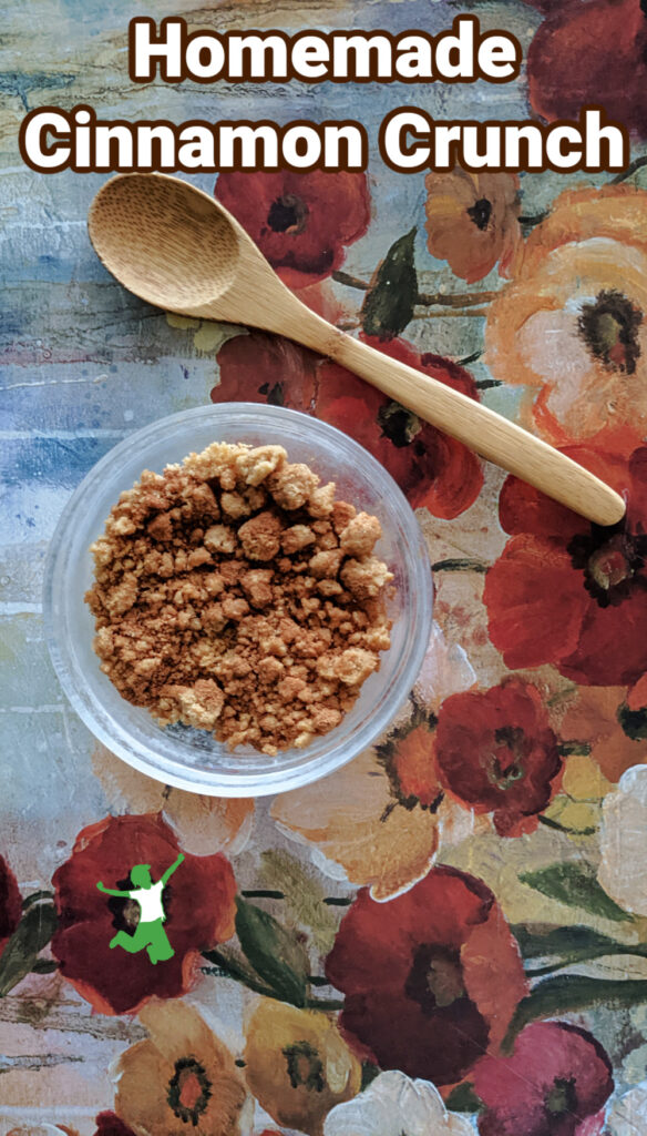 healthy cinnamon crunch in bowl with bamboo spoon