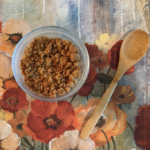 homemade cinnamon crunch cereal in glass bowl