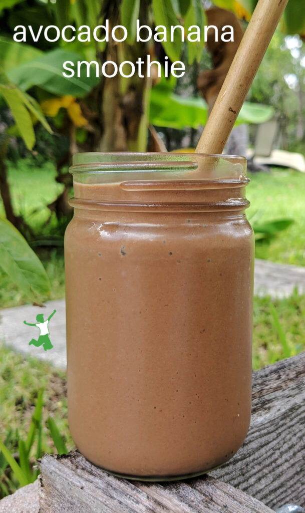 avocado banana smoothie in a glass natural background