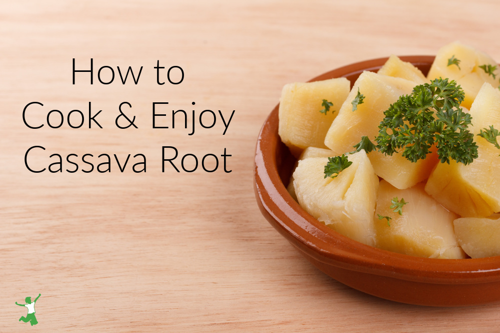 cooked cassava in a clay bowl with parsley sprig