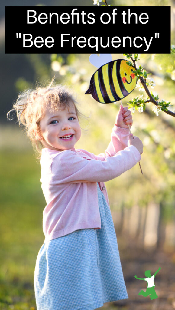 little girl happy from listening to therapeutic bee sounds