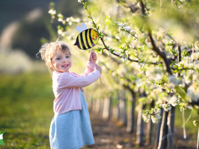 child enjoying healing bee frequency from golden hum of buzzing hive