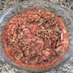traditional wild rice casserole in glass baking dish