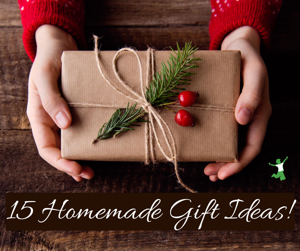 man holding a homemade gift inside christmas decorated box