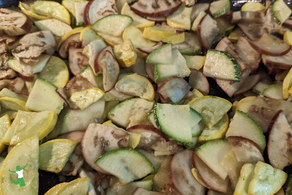 medley of colorful roast vegetables in baking pan