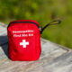 homeopathic holistic first aid kit on wooden dock