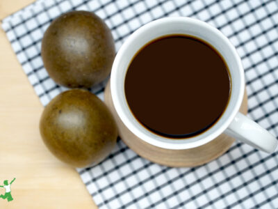 cup of coffee sweetened with monk fruit on tablecloth