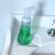 nontoxic liquid hand soap dispenser on white sink