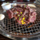 grilled steak at a restaurant with garlic and butter