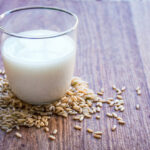 fermented rice milk in glass on wood counter