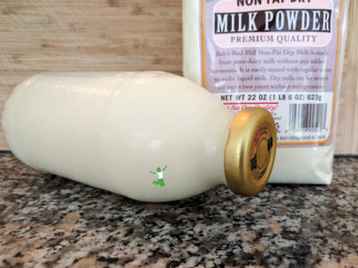 organic milk powder in a bag on countertop