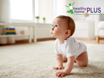 baby exposed to mRNA jabs crawling on white carpet floor