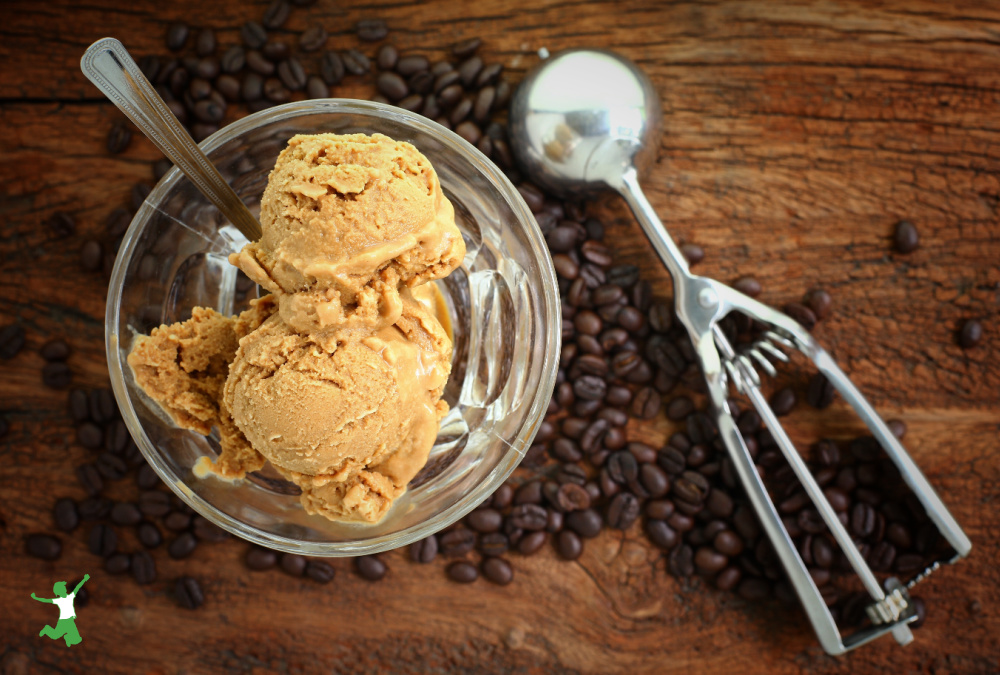 dairy-free coffee ice cream in glass bowl on wooden table