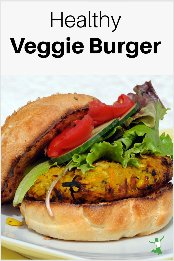 healthy veggie burger with lettuce and tomato on sourdough bun