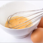 Russian custard egg yolks in white bowl