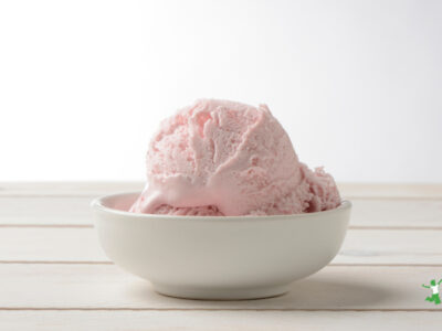 cultured strawberry ice cream in white bowl