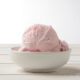 cultured strawberry ice cream in white bowl