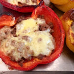 spicy stuffed bell peppers in baking pan