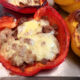 spicy stuffed bell peppers in baking pan