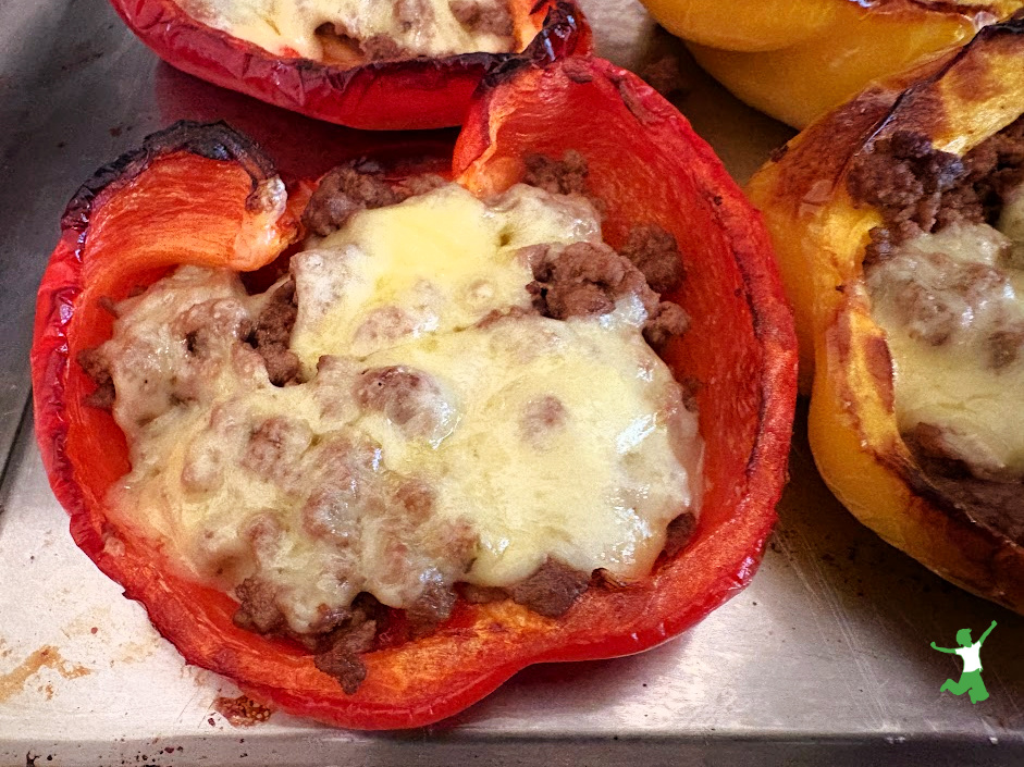 spicy stuffed bell peppers in baking pan