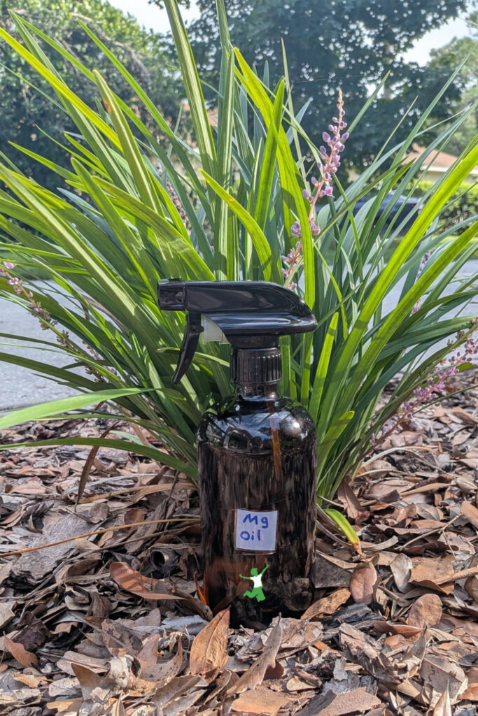 DIY magnesium oil bottle with natural background