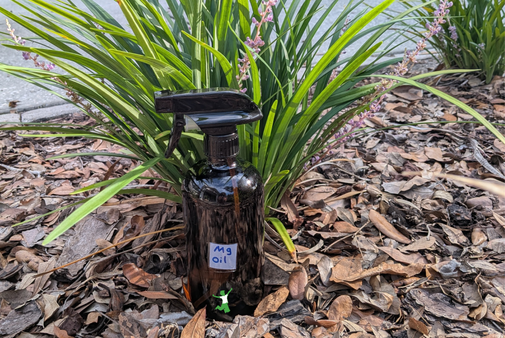 homemade magnesium oil in a glass spray bottle