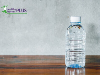 flouride contaminated bottled water on wooden table