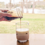 healthy chocolate syrup in a glass of milk