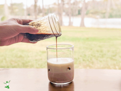 healthy chocolate syrup in a glass of milk