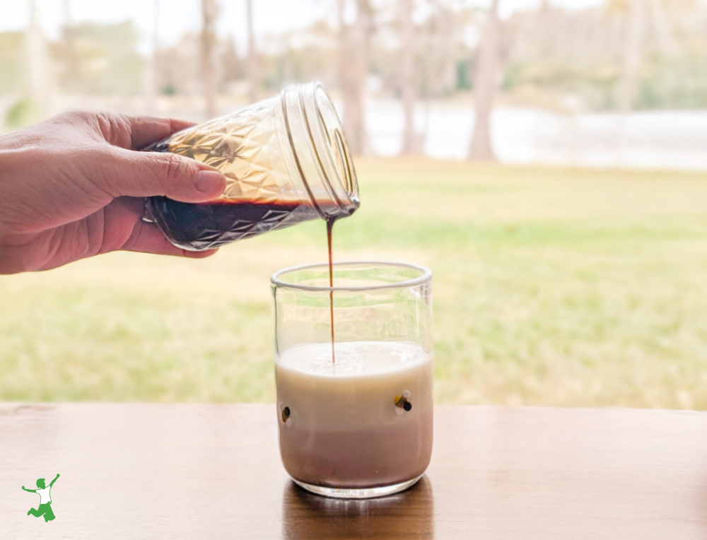 healthy chocolate syrup in a glass of milk