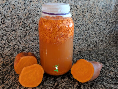 cultured sweet potato beverage in mason jar
