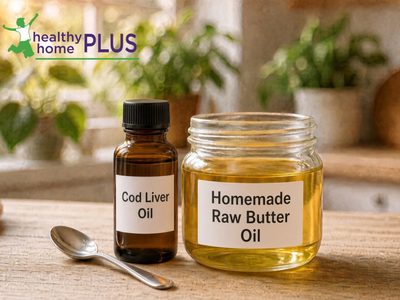 homemade raw butter oil in small glass jar with spoon