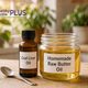 homemade raw butter oil in small glass jar with spoon